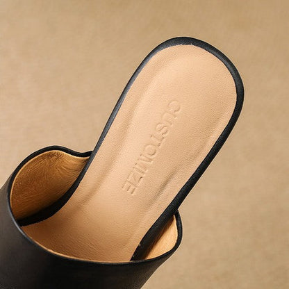 Virelle Curve Leder Mules mit Absatz